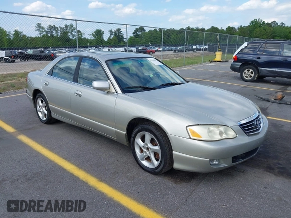 2002 Mazda Millenia with VIN JM1TA221721722364, listed as a IAAI auction lot 42160683 with 166,778 mi miles and . Bid and sale history available at DreamBid. Image 1.
