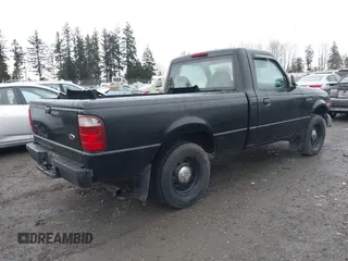 2003 Ford Ranger XL with VIN 1FTYR10DX3PB48637, listed as a IAAI auction lot 41518614 with 105,394 mi miles. Bid and sale history available at carsss.com. Image 4.