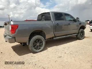 2019 Nissan Titan XD SV with VIN 1N6BA1F48KN525378, listed as a Copart auction lot 69529294 with 61,756 mi miles and Salvage Title. Bid and sale history available at carsss.com. Image 3.