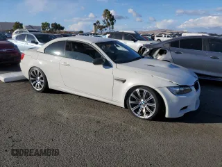2011 BMW M3 with VIN WBSDX9C59BE784136, listed as a Copart auction lot 77696754 with 71,332 mi miles and Salvage Title. Bid and sale history available at carsss.com. Image 4.
