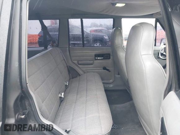 1996 Jeep Cherokee SE with VIN 1J4FJ28S9TL135564, listed as a IAAI auction lot 41618367 with 249,410 mi miles and . Bid and sale history available at DreamBid. Image 8.