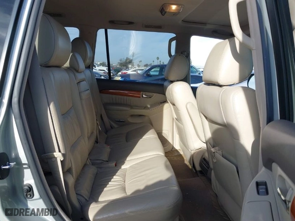 2004 Lexus GX 470 with VIN JTJBT20X340025955, listed as a IAAI auction lot 41673289 with 106,701 mi miles. Bid and sale history available at carsss.com. Image 8.