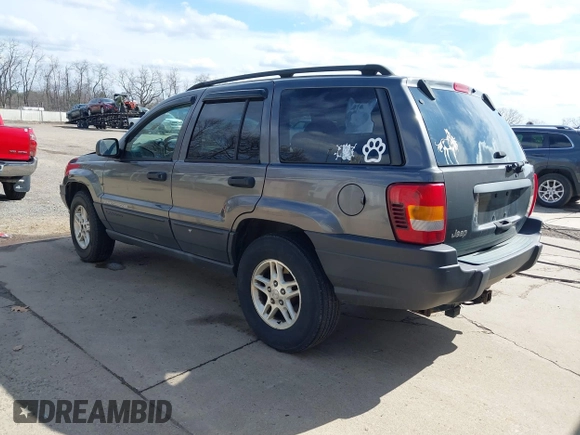 2003 Jeep Grand Cherokee Laredo with VIN 1J4GX48S53C504225, listed as a IAAI auction lot 41879669 with 247,246 mi miles. Bid and sale history available at carsss.com. Image 3.