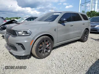 2021 Dodge Durango SRT Hellcat с VIN 1C4SDJH96MC689195, выставлен на аукционе Copart как лот 65217615 с пробегом Не указан миль и Списание • Salvage title. История ставок и продаж доступна на DreamBid. Изображение 1.