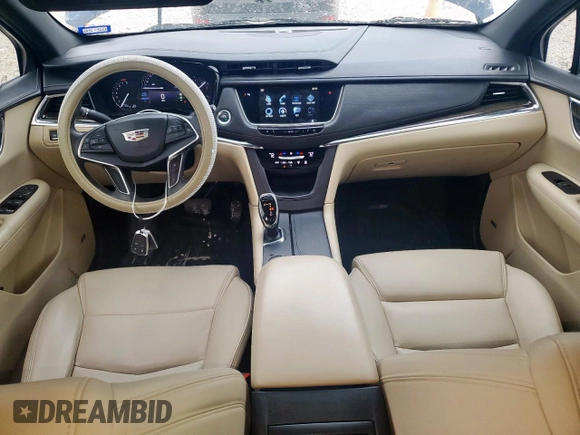 2017 Cadillac XT5 FWD with VIN 1GYKNARS8HZ162612, listed as a Copart auction lot 58727265 with 100,494 mi miles and Clean title. Bid and sale history available at DreamBid. Image 8.
