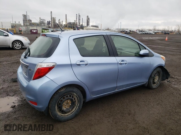 2012 Toyota Yaris L with VIN JTDKTUD33CD517298, listed as a Copart auction lot 52099335 with Not Provided miles and Salvage Title. Bid and sale history available at DreamBid. Image 3.
