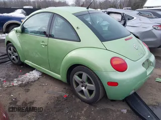 2003 Volkswagen New Beetle Coupe GLS with VIN 3VWCD21C23M415115, listed as a IAAI auction lot 41288921 with 67,656 mi miles. Bid and sale history available at carsss.com. Image 3.