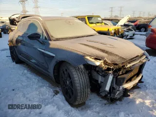 2021 Aston Martin DBX z VIN SCFVUJAW9MTV02708, wystawiony jako Copart lot #85731374 z przebiegiem Nie podano mil oraz Szkoda całkowita • Salvage title. Historia ofert i sprzedaży dostępna na DreamBid. Obrazek 4.