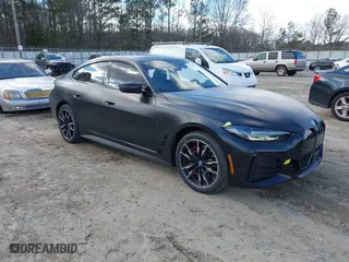 2023 BMW i4 M50 with VIN WBY33AW04PFP30422, listed as a IAAI auction lot 41359006 with 23,199 mi miles. Bid and sale history available at carsss.com. Image 1.