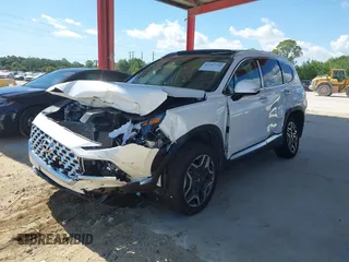2023 Hyundai Santa Fe Limited z VIN 5NMS4DAL8PH655580, wystawiony jako IAAI lot #42267740 z przebiegiem 10 170 mil mil oraz . Historia ofert i sprzedaży dostępna na DreamBid. Obrazek 2.
