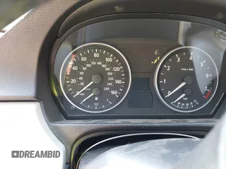 2006 BMW 3 Series 330xi with VIN WBAVD33526KV66805, listed as a IAAI auction lot 40047893 with 167,625 mi miles. Bid and sale history available at carsss.com. Image 7.
