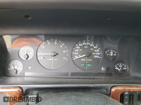 1997 Jeep Grand Cherokee Limited with VIN 1J4GZ78Y0VC599554, listed as a Copart auction lot 72006854 with 321,283 mi miles and Salvage Title. Bid and sale history available at carsss.com. Image 9.