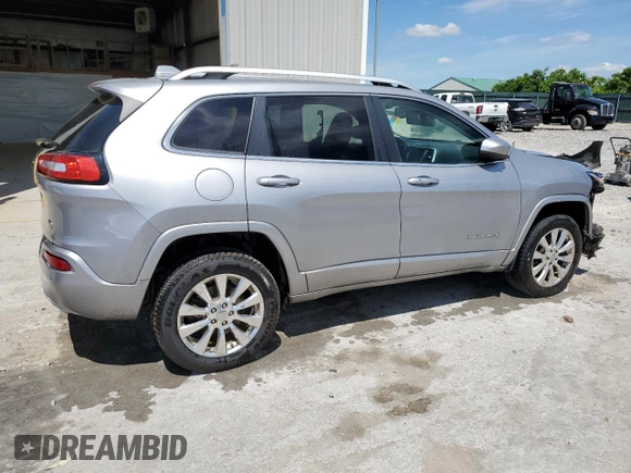 2016 Jeep Cherokee Overland z VIN 1C4PJMJSXGW300719, wystawiony jako Copart lot #58216665 z przebiegiem 128 016 mil mil oraz Szkoda całkowita • Salvage title. Historia ofert i sprzedaży dostępna na DreamBid. Obrazek 3.