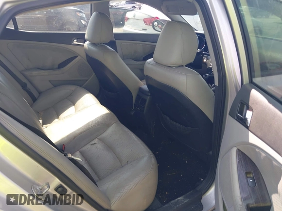 2013 Kia Optima EX with VIN 5XXGN4A75DG092276, listed as a IAAI auction lot 42306138 with 201,649 mi miles and . Bid and sale history available at DreamBid. Image 8.
