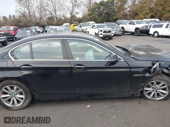 2014 BMW 5 Series 528i with VIN WBA5A5C5XED502261, listed as a IAAI auction lot 41418334 with 139,983 mi miles. Bid and sale history available at carsss.com. Image 13.