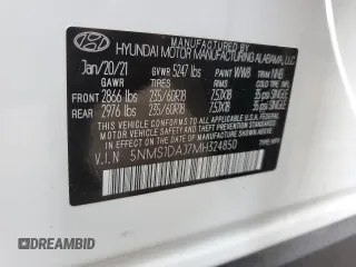 2021 Hyundai Santa Fe SE with VIN 5NMS1DAJ7MH324850, listed as a Copart auction lot 64805225 with 62,009 mi miles and Salvage title. Bid and sale history available at DreamBid. Image 13.