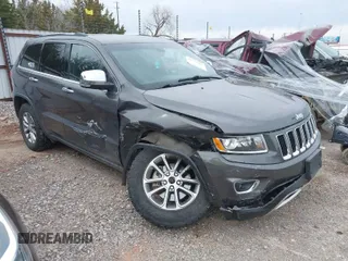 2014 Jeep Grand Cherokee Limited z VIN 1C4RJFBG9EC416992, wystawiony jako IAAI lot #41777481 z przebiegiem 140 509 mil mil oraz . Historia ofert i sprzedaży dostępna na DreamBid. Obrazek 1.
