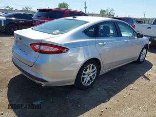 2014 Ford Fusion SE with VIN 1FA6P0H77E5400628, listed as a IAAI auction lot 42001344 with 192,511 mi miles and . Bid and sale history available at DreamBid. Image 4.