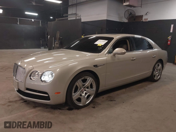 2015 Bentley Flying Spur V8 with VIN SCBET9ZAXFC042716, listed as a IAAI auction lot 42621840 with 47,299 mi miles and . Bid and sale history available at DreamBid. Image 2.