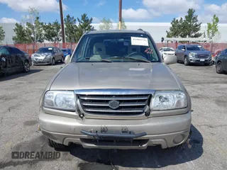 2003 Suzuki XL-7 Touring with VIN JS3TX92V634107042, listed as a IAAI auction lot 41902576 with 176,439 mi miles. Bid and sale history available at carsss.com. Image 6.