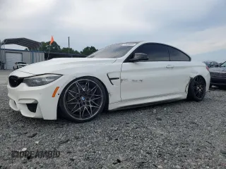 2018 BMW M4 with VIN WBS4Y9C58JAC86483, listed as a Copart auction lot 57056035 with 58,922 mi miles and Salvage title. Bid and sale history available at DreamBid. Image 1.