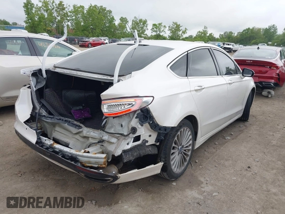 2016 Ford Fusion Titanium with VIN 3FA6P0K96GR103571, listed as a IAAI auction lot 42340764 with 180,870 mi miles and . Bid and sale history available at DreamBid. Image 4.