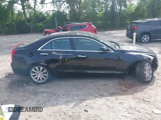 2014 Cadillac ATS Luxury AWD z VIN 1G6AH5RX1E0164796, wystawiony jako IAAI lot #42211010 z przebiegiem 167 079 mil mil oraz . Historia ofert i sprzedaży dostępna na DreamBid. Obrazek 13.