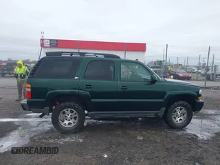 2004 Chevrolet Tahoe Z71 z VIN 1GNEK13Z84R118371, wystawiony jako IAAI lot #41535389 z przebiegiem 255 815 mil mil oraz . Historia ofert i sprzedaży dostępna na DreamBid. Obrazek 13.