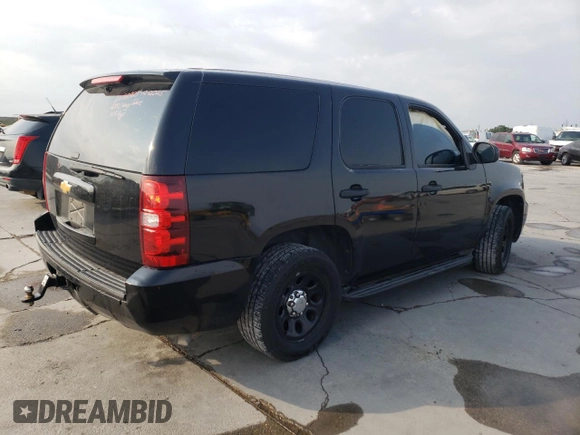 2013 Chevrolet Tahoe Commercial with VIN 1GNLC2E00DR304026, listed as a Copart auction lot 57041135 with 125,087 mi miles and Salvage title. Bid and sale history available at DreamBid. Image 3.
