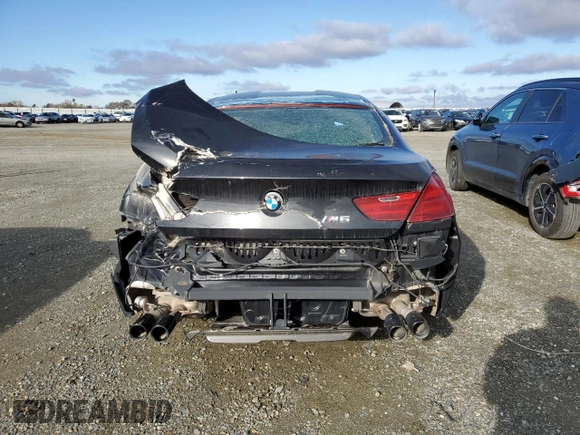 2017 BMW M6 with VIN WBS6E9C52HG437288, listed as a Copart auction lot 38576804 with 25,137 mi miles and Clean title. Bid and sale history available at DreamBid. Image 6.