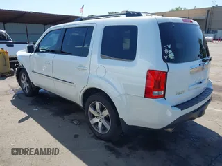 2013 Honda Pilot Touring with VIN 5FNYF4H92DB031589, listed as a IAAI auction lot 42159313 with 192,604 mi miles and . Bid and sale history available at carsss.com. Image 3.