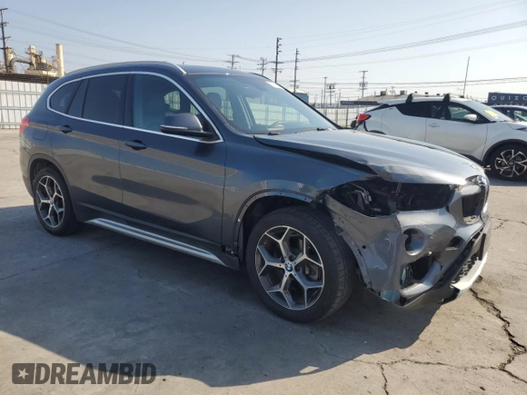 2018 BMW X1 sDrive28i with VIN WBXHU7C35J5L09783, listed as a Copart auction lot 55147935 with 37,114 mi miles and Salvage Title. Bid and sale history available at DreamBid. Image 4.