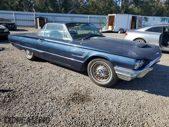 1965 Ford Thunderbird with VIN 5Y85Z115781, listed as a Copart auction lot 82289124 with 75,677 mi miles and Salvage Title. Bid and sale history available at DreamBid. Image 4.