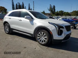 2022 Cadillac XT4 FWD Premium Luxury with VIN 1GYFZCR45NF100049, listed as a Copart auction lot 50213255 with 62,391 mi miles and Salvage title. Bid and sale history available at DreamBid. Image 4.