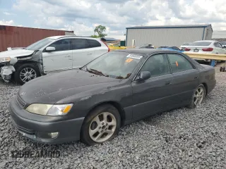 2001 Lexus ES 300 z VIN JT8BF28G710329704, wystawiony jako Copart lot #54968005 z przebiegiem 182 008 mil mil oraz Czysty tytuł • Clean title. Historia ofert i sprzedaży dostępna na DreamBid. Obrazek 1.