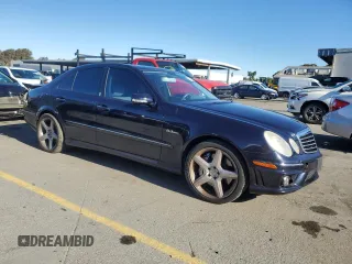 2007 Mercedes-Benz E 63 AMG with VIN WDBUF77X67B008192, listed as a Copart auction lot 82449274 with 125,126 mi miles and Salvage Title. Bid and sale history available at carsss.com. Image 4.