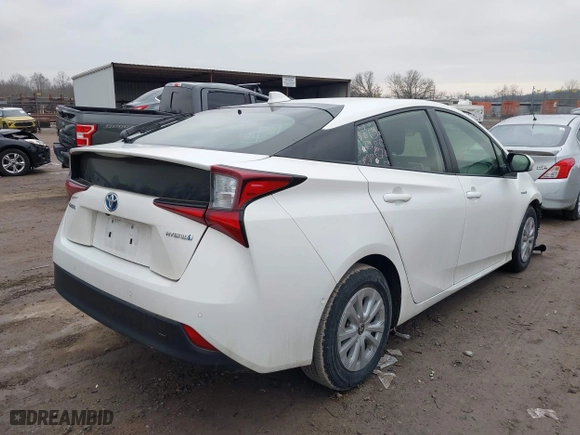2021 Toyota Prius L Eco with VIN JTDKAMFU1M3149867, listed as a IAAI auction lot 41417036 with 84,421 mi miles. Bid and sale history available at carsss.com. Image 4.