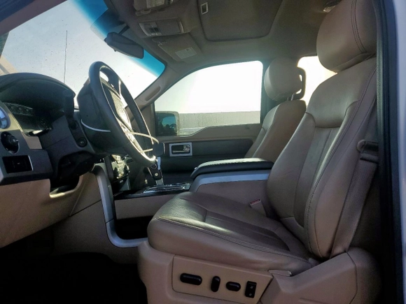 2014 Ford F-150 XL with VIN 1FTFW1EF0EKF18679, listed as a Copart auction lot 60872435 with 128,203 mi miles and Salvage title. Bid and sale history available at DreamBid. Image 7.