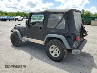 2004 Jeep Wrangler SE with VIN 1J4FA29124P796031, listed as a Copart auction lot 56875525 with 239,488 mi miles and Clean title. Bid and sale history available at DreamBid. Image 2.