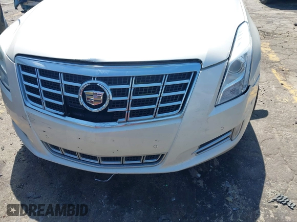 2014 Cadillac XTS Luxury with VIN 2G61M5S32E9310910, listed as a IAAI auction lot 41978298 with Not provided miles and . Bid and sale history available at DreamBid. Image 6.