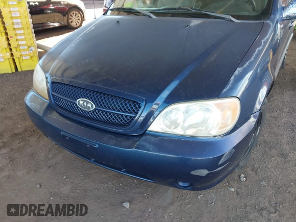 2005 Kia Sedona LX with VIN KNDUP132X56697388, listed as a IAAI auction lot 40695710 with 217,116 mi miles. Bid and sale history available at carsss.com. Image 6.