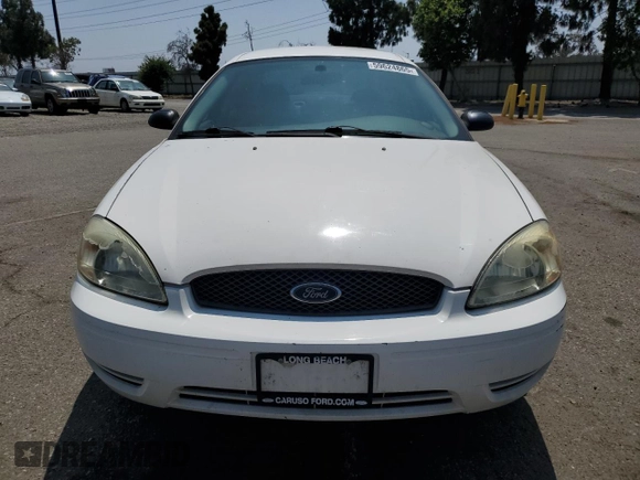 2006 Ford Taurus SE with VIN 1FAFP53U96A104173, listed as a Copart auction lot 59624865 with 145,005 mi miles and Salvage title. Bid and sale history available at DreamBid. Image 5.