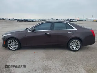 2016 Cadillac CTS Luxury Collection RWD z VIN 1G6AR5SX7G0111806, wystawiony jako IAAI lot #41908192 z przebiegiem 86 309 mil mil oraz . Historia ofert i sprzedaży dostępna na DreamBid. Obrazek 14.