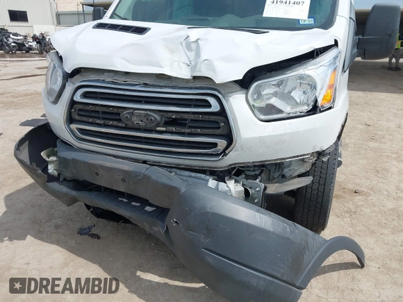 2018 Ford Transit with VIN 1FTYR1YM1JKA98581, listed as a IAAI auction lot 41941407 with 98,543 mi miles and . Bid and sale history available at carsss.com. Image 6.