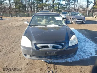 2008 Kia Optima LX with VIN KNAGE123685167925, listed as a IAAI auction lot 41072279 with 168,180 mi miles. Bid and sale history available at carsss.com. Image 12.