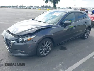 2018 Mazda 3 Touring with VIN 3MZBN1L32JM268582, listed as a IAAI auction lot 42072435 with 61,417 mi miles. Bid and sale history available at carsss.com. Image 17.