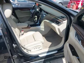 2013 Cadillac XTS Premium with VIN 2G61S5S39D9144177, listed as a IAAI auction lot 42111910 with 69,830 mi miles. Bid and sale history available at carsss.com. Image 5.