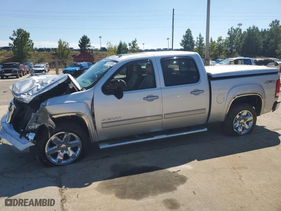 2013 GMC Sierra 1500 SLT with VIN 3GTP2WE70DG210472, listed as a Copart auction lot 70811604 with 111,002 mi miles and Salvage Title. Bid and sale history available at carsss.com. Image 1.