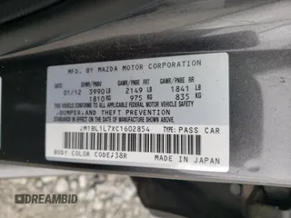 2012 Mazda 3 i Touring with VIN JM1BL1L7XC1602854, listed as a Copart auction lot 52095685 with 237,670 mi miles and Non Repairable. Bid and sale history available at DreamBid. Image 12.