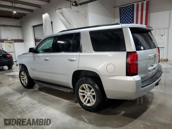2015 Chevrolet Tahoe LT with VIN 1GNSKBKC1FR234889, listed as a Copart auction lot 60786475 with 255,271 mi miles and Salvage title. Bid and sale history available at DreamBid. Image 2.